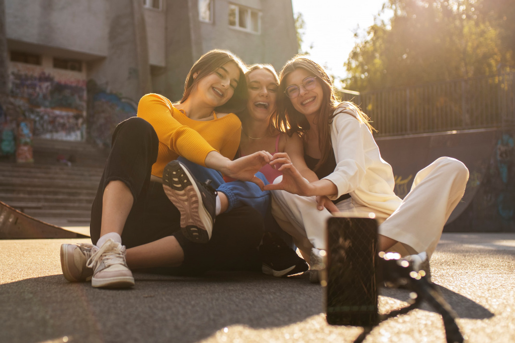 young-teenage-girls-recording-reels-themselves-outdoors-social-media (1).jpg