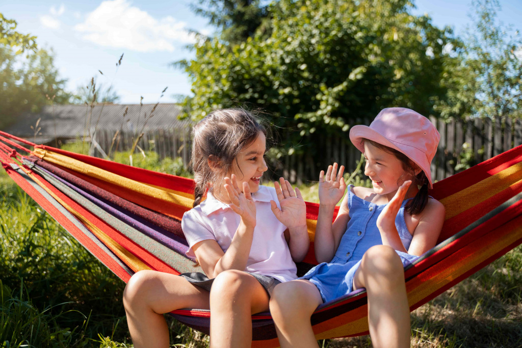 girls-playing-outdoors-together-sitting-hammock (1).jpg girls-playing-outdoors-together-sitting-hammock (1).jpg