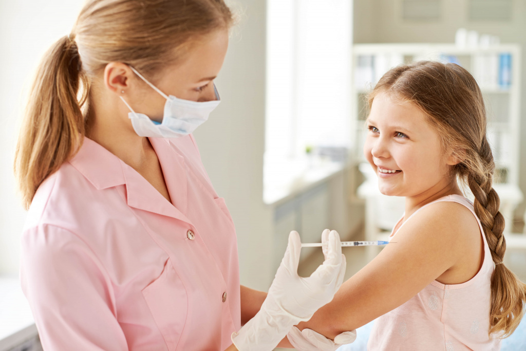 nurse-injecting-smiling-girl (1).jpg nurse-injecting-smiling-girl (1).jpg